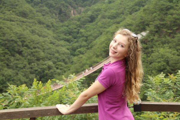 Pretty girl having a photo taken at Gamaksan Suspension Bridge in Paju