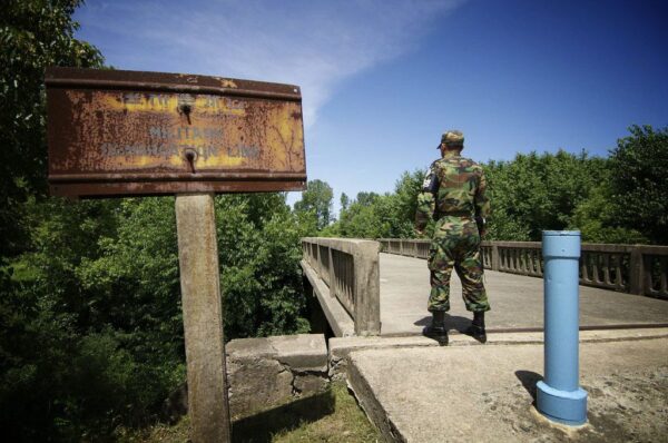 A South Korean soldier guarding the The Bridge of No Return at the Joint Security Area between South and North Korea