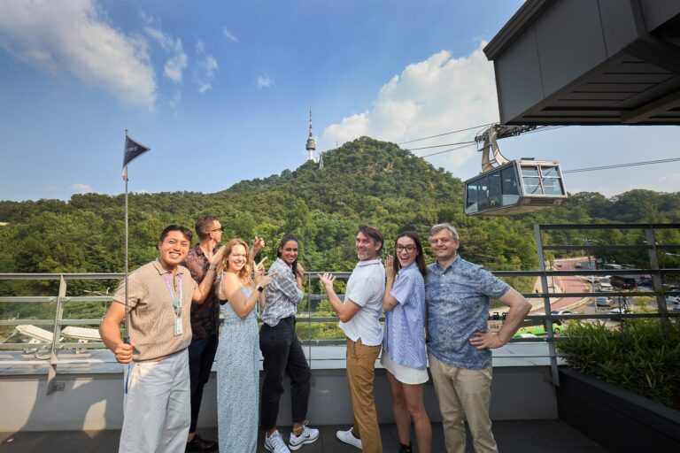A tour group getting ready to board the Namsan Cable Car